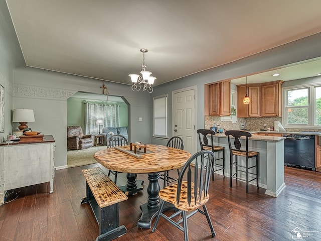 5825 Edgewood Blvd, Monroe, MI 48161 - dining space with a chandelier and dark wood-style flooring