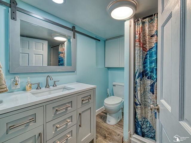 5825 Edgewood Blvd, Monroe, MI 48161 - full bathroom with vanity, wood finished floors, and a shower with curtain