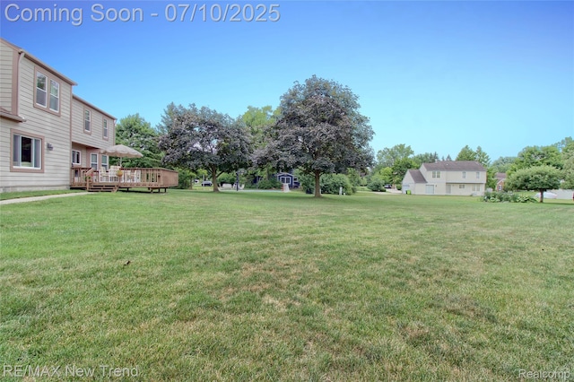 21905 Roxbury Dr, Novi, MI 48374 - view of grassy yard featuring a wooden deck