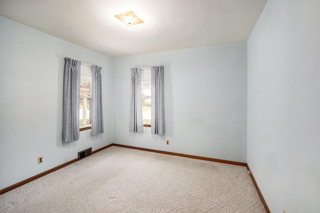 2329 Moon St, Muskegon, MI 49441 - unfurnished room featuring carpet and baseboards