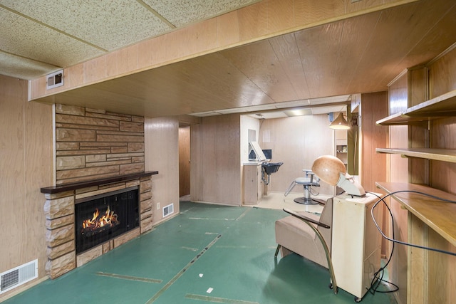 2329 Moon St, Muskegon, MI 49441 - finished below grade area featuring a fireplace and wooden walls