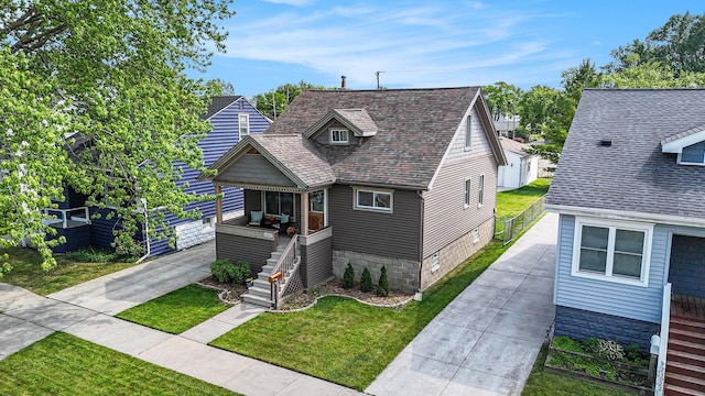 23926 Elmira St, Saint Clair Shores, MI 48082 - view of front of home with stairs and concrete driveway