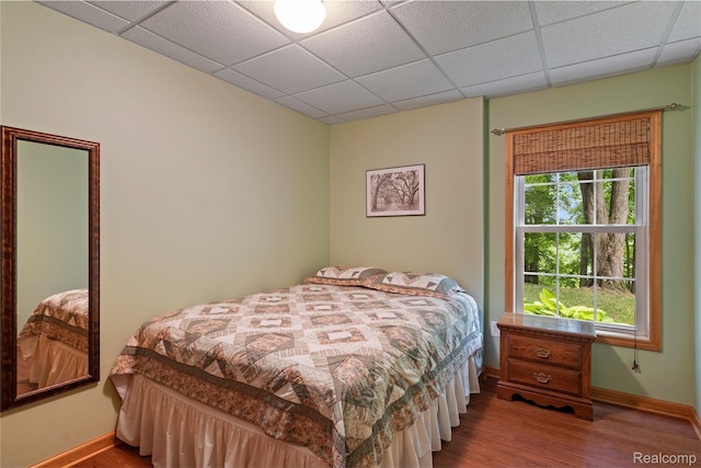 12151 Vergennes St, Lowell, MI 49331 - bedroom with wood finished floors and a paneled ceiling