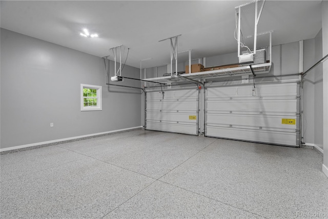 12151 Vergennes St, Lowell, MI 49331 - garage featuring a garage door opener