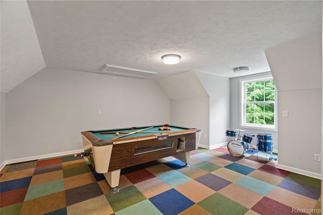 12151 Vergennes St, Lowell, MI 49331 - rec room featuring attic access, vaulted ceiling, billiards table, and a textured ceiling