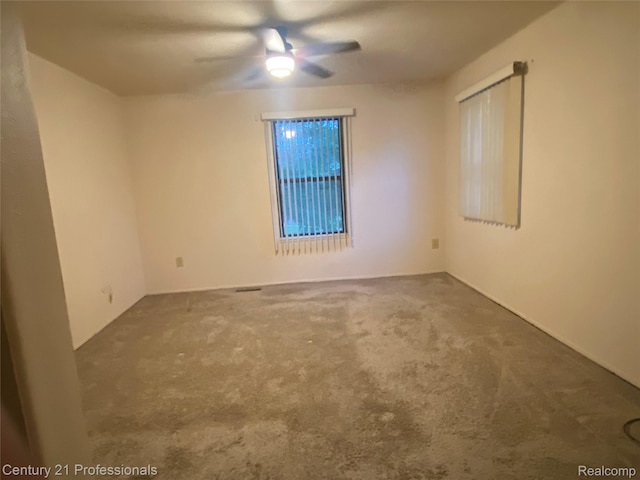 24857 Auburn Ln, Southfield, MI 48033 - unfurnished room featuring a ceiling fan and carpet flooring