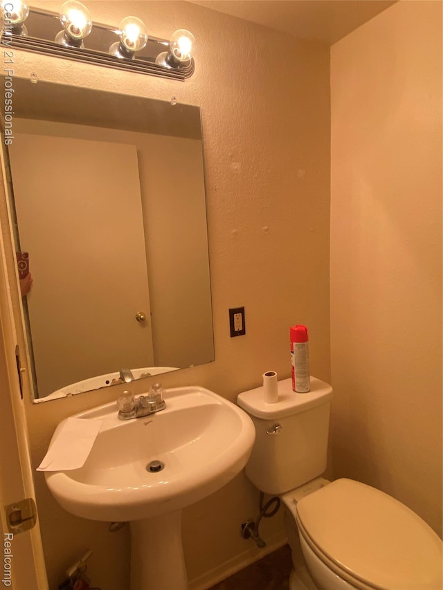 24857 Auburn Ln, Southfield, MI 48033 - half bathroom with toilet and a sink