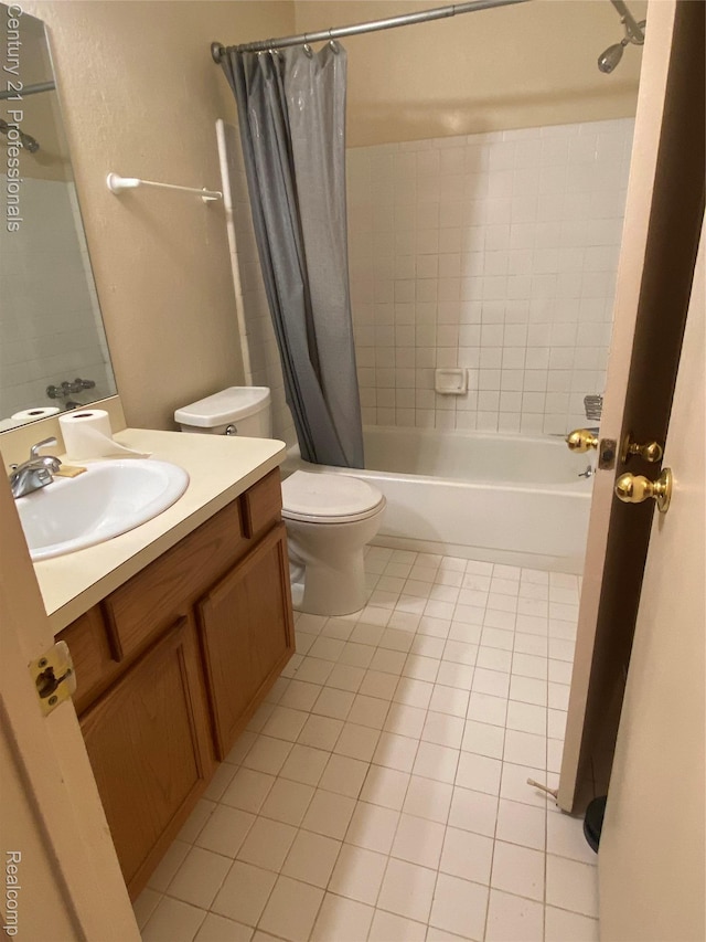 24857 Auburn Ln, Southfield, MI 48033 - bathroom with tile patterned floors, vanity, and shower / tub combo