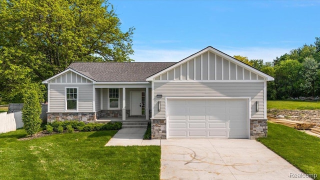 7268 Elizabeth Lake Rd, Waterford, MI 48327 - view of front of home featuring board and batten siding, covered porch, stone siding, driveway, and a garage