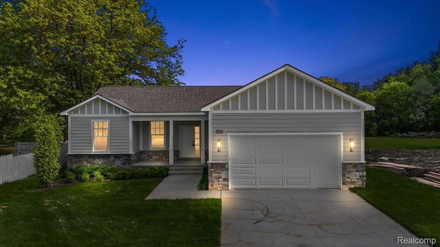 7268 Elizabeth Lake Rd, Waterford, MI 48327 - view of front facade with stone siding, a shingled roof, driveway, a porch, and board and batten siding