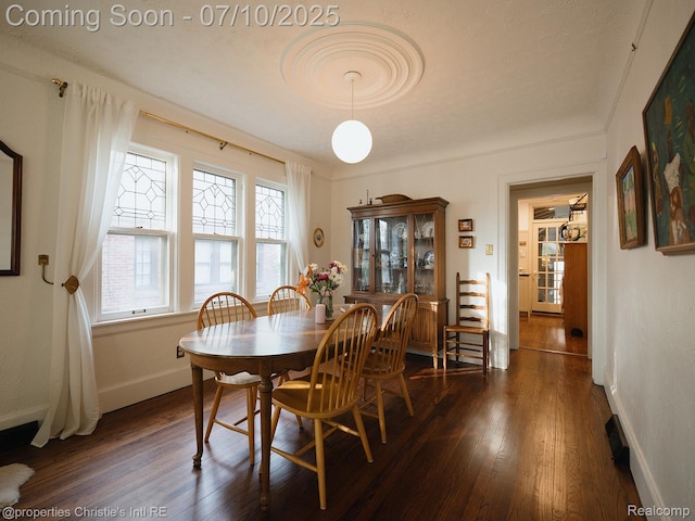 4858 Yorkshire Rd, Detroit, MI 48224 - dining area featuring dark wood-type flooring