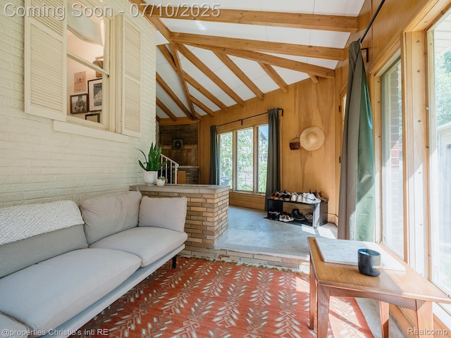 4858 Yorkshire Rd, Detroit, MI 48224 - living area with wood walls and carpet floors