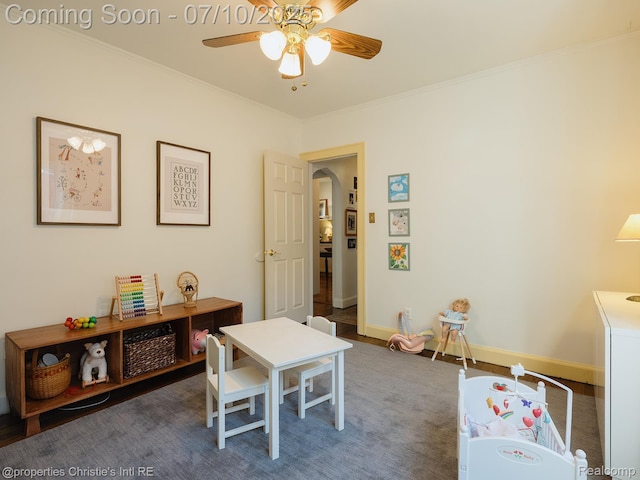4858 Yorkshire Rd, Detroit, MI 48224 - rec room with arched walkways, a ceiling fan, and ornamental molding