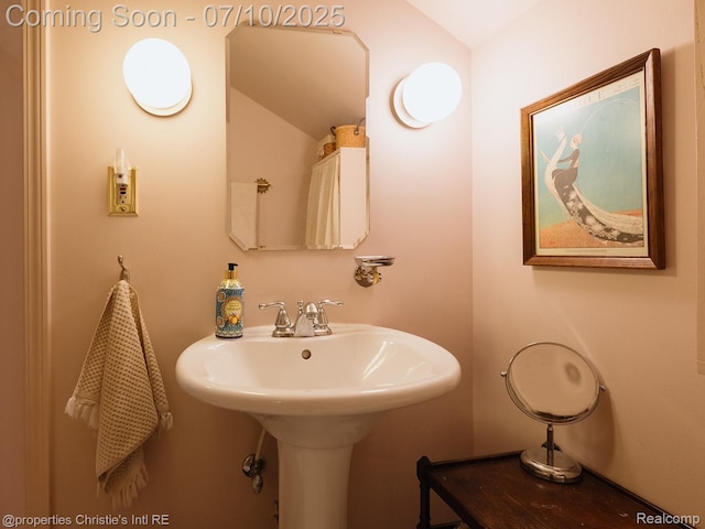 4858 Yorkshire Rd, Detroit, MI 48224 - bathroom with lofted ceiling and a sink