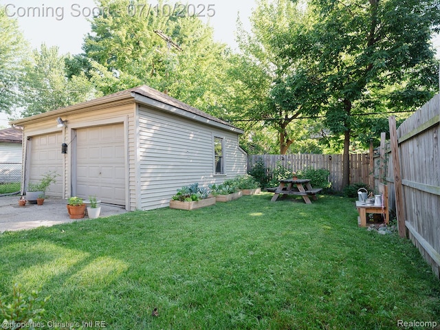 4858 Yorkshire Rd, Detroit, MI 48224 - fenced yard with an outbuilding and a detached garage
