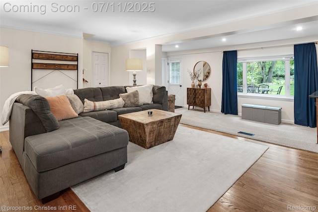27461 Goldengate Dr W, Lathrup Village, MI 48076 - living room featuring wood finished floors, recessed lighting, and ornamental molding