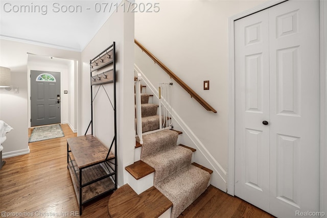 27461 Goldengate Dr W, Lathrup Village, MI 48076 - entryway featuring stairway, light wood-type flooring, and crown molding