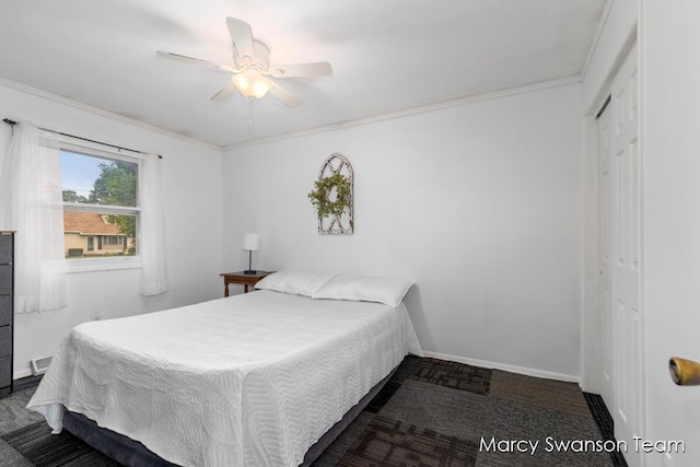 4172 Ranchero Dr, Dorr, MI 49323 - bedroom with a closet, crown molding, and a ceiling fan