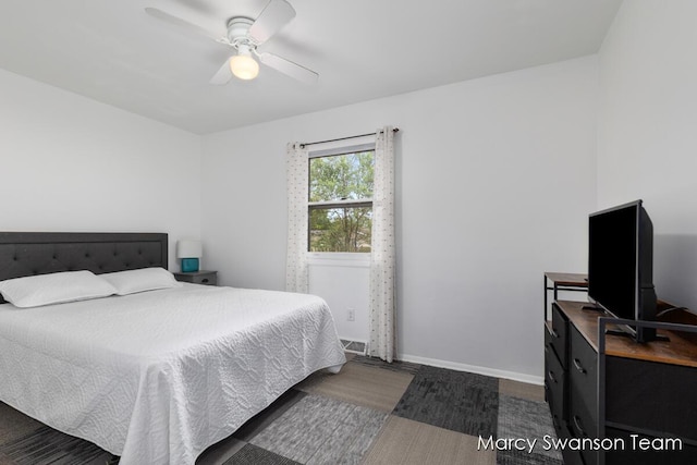 4172 Ranchero Dr, Dorr, MI 49323 - bedroom featuring a ceiling fan and wood finished floors