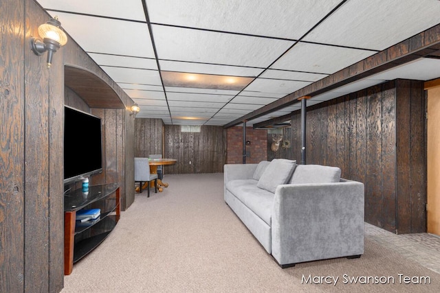 4172 Ranchero Dr, Dorr, MI 49323 - living area with carpet flooring and wooden walls