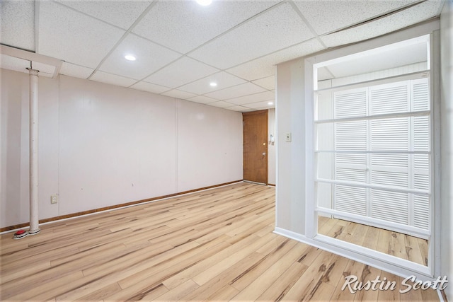 2953-2955 Okemos Dr SE, Grand Rapids, MI 49546 - empty room with wood finished floors, a paneled ceiling, and recessed lighting