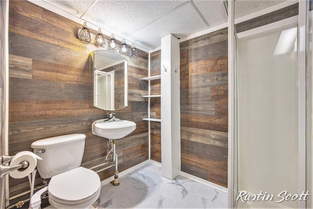 2953-2955 Okemos Dr SE, Grand Rapids, MI 49546 - bathroom featuring wooden walls, marble look tile flooring, and a drop ceiling