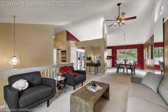 6873 Fox Ln, Waterford, MI 48327 - living area featuring carpet flooring, ceiling fan, and high vaulted ceiling