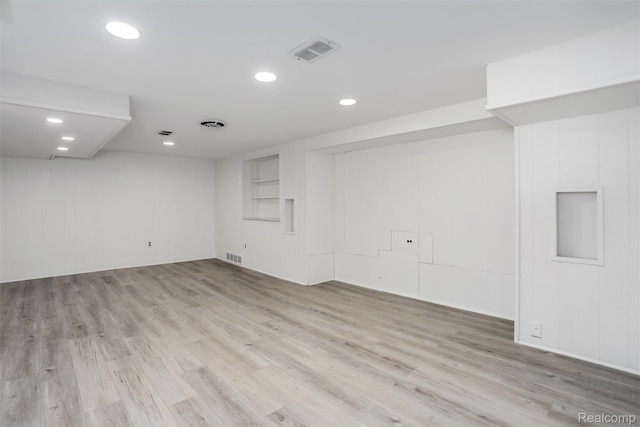21710 Whitmore St, Oak Park, MI 48237 - finished basement with light wood-style flooring and recessed lighting