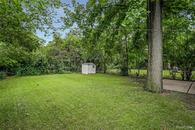 21710 Whitmore St, Oak Park, MI 48237 - view of yard featuring a storage shed