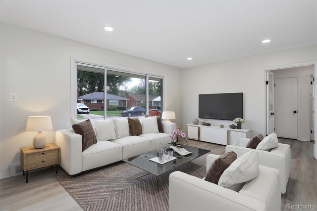 21710 Whitmore St, Oak Park, MI 48237 - living area featuring light wood-style floors and recessed lighting