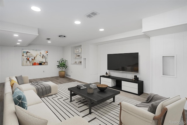 21710 Whitmore St, Oak Park, MI 48237 - living area featuring light wood finished floors, recessed lighting, and built in shelves