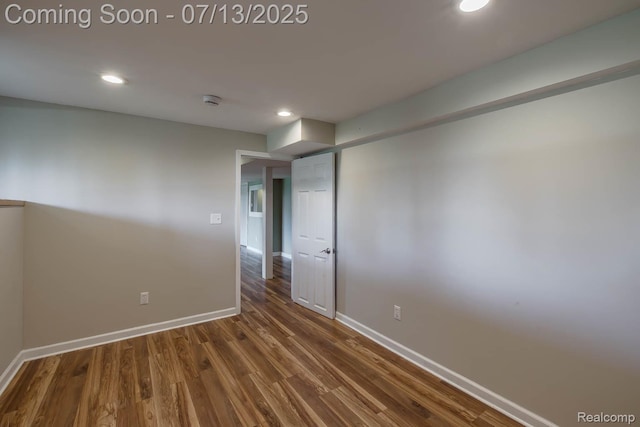 7709 Shelley Dr, Clarkston, MI 48348 - spare room with wood finished floors, recessed lighting, and a smoke detector