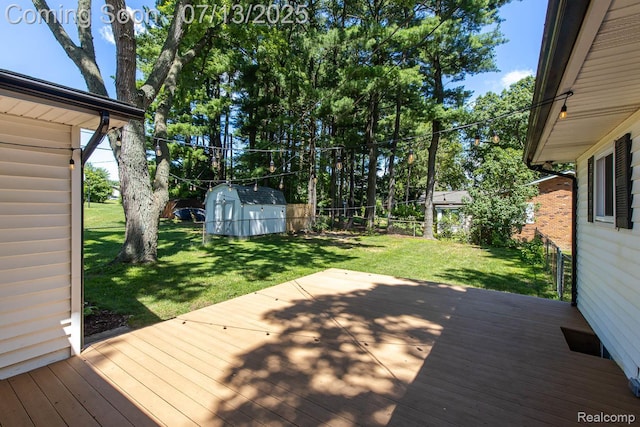7709 Shelley Dr, Clarkston, MI 48348 - wooden deck with a storage unit