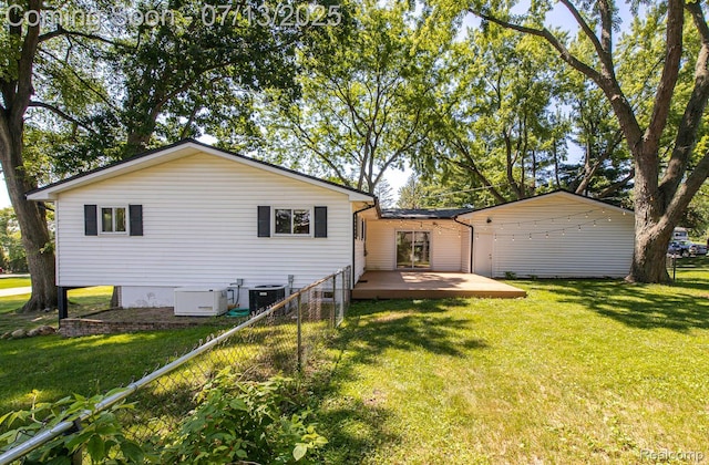 7709 Shelley Dr, Clarkston, MI 48348 - back of property featuring a deck