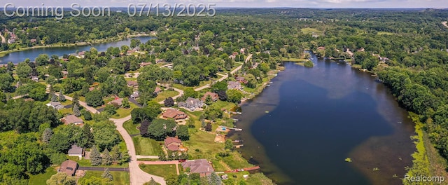 7709 Shelley Dr, Clarkston, MI 48348 - drone / aerial view of a large body of water and a heavily wooded area