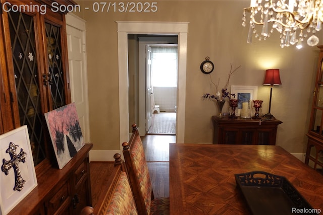 341 W Oakridge St W, Ferndale, MI 48220 - dining space with a chandelier and wood finished floors