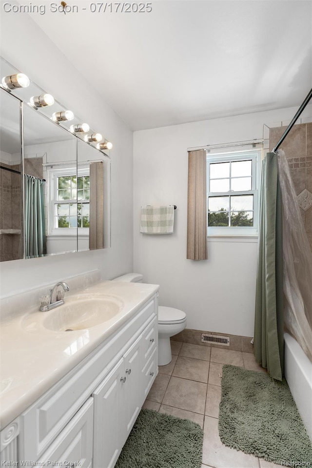 1046 Stonehenge Rd, Flint, MI 48532 - full bathroom with vanity, tile patterned flooring, and shower / bath combination with curtain