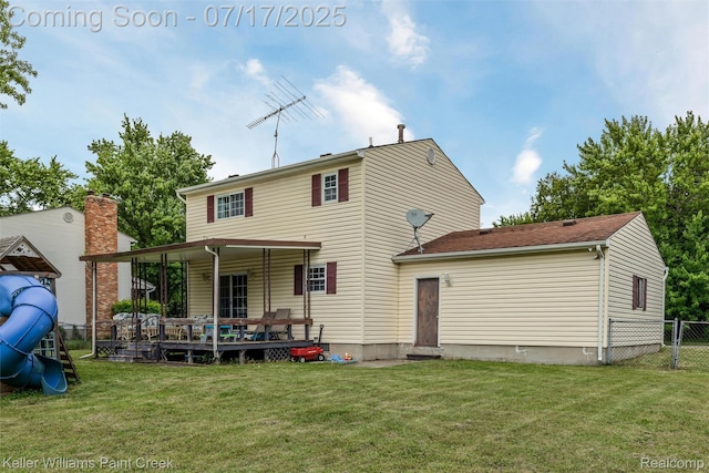 1046 Stonehenge Rd, Flint, MI 48532 - back of house with a deck