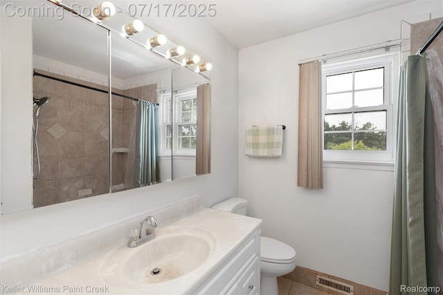 1046 Stonehenge Rd, Flint, MI 48532 - full bathroom with vanity, tile patterned floors, and tiled shower