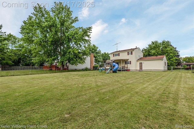 1046 Stonehenge Rd, Flint, MI 48532 - view of yard featuring a playground