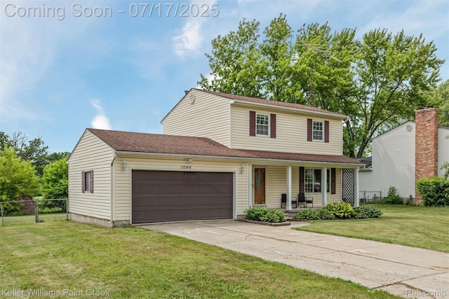 1046 Stonehenge Rd, Flint, MI 48532 - traditional home featuring a porch, an attached garage, and concrete driveway