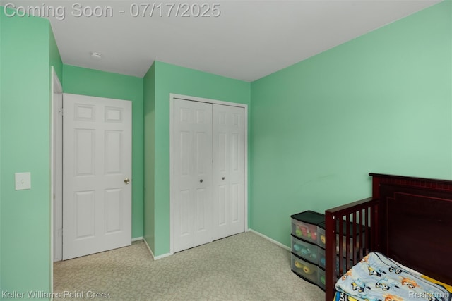 1046 Stonehenge Rd, Flint, MI 48532 - carpeted bedroom with a closet and a nursery area