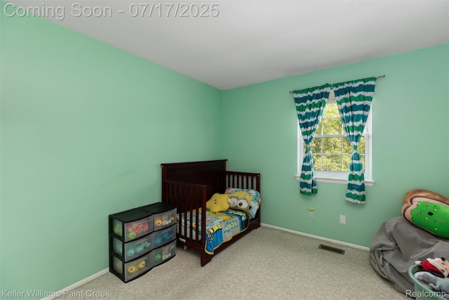 1046 Stonehenge Rd, Flint, MI 48532 - bedroom with carpet flooring and baseboards