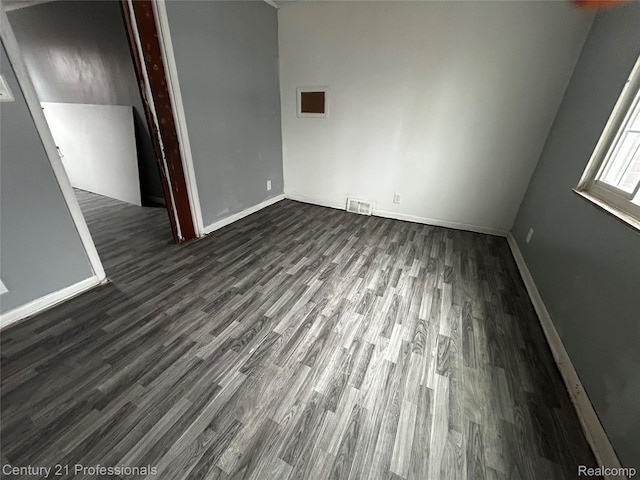 15451 Prest St, Detroit, MI 48227 - unfurnished room with dark wood-type flooring and baseboards