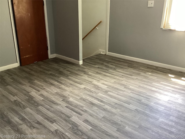 15451 Prest St, Detroit, MI 48227 - unfurnished bedroom with a closet and wood finished floors