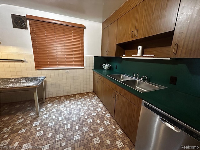15451 Prest St, Detroit, MI 48227 - kitchen with dishwasher, tile walls, dark countertops, wainscoting, and open shelves