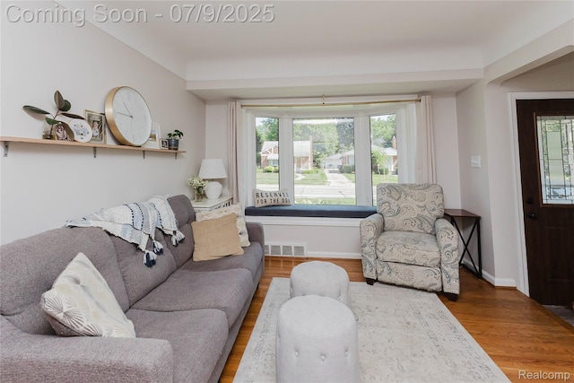 437 Normandy Rd, Royal Oak, MI 48073 - living area featuring wood finished floors and baseboards