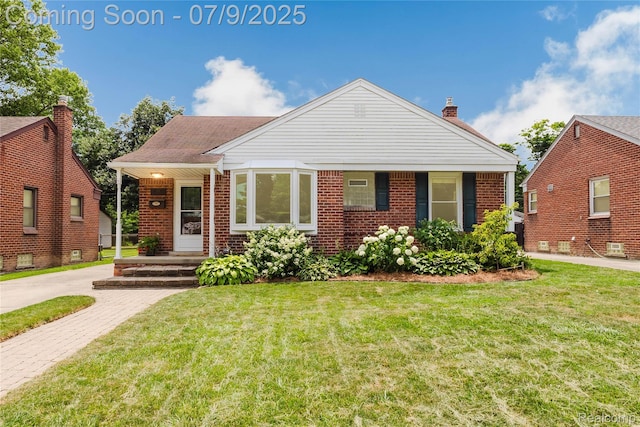 437 Normandy Rd, Royal Oak, MI 48073 - bungalow-style home with a front yard, brick siding, and covered porch
