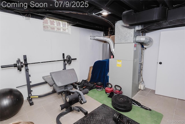437 Normandy Rd, Royal Oak, MI 48073 - exercise area featuring heating unit and tile patterned flooring