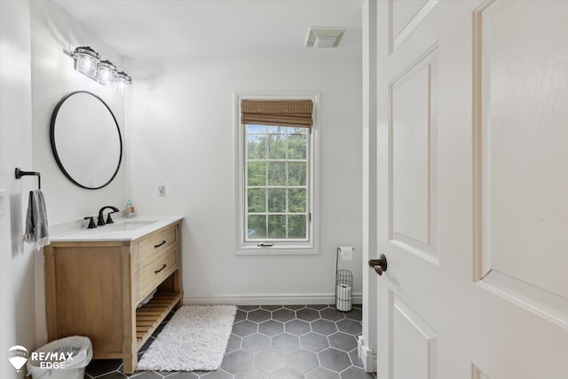 7266 Dodge Rd, Montrose, MI 48457 - bathroom with vanity and tile patterned floors